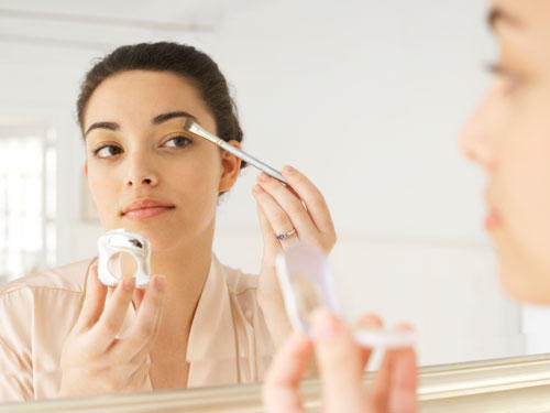 1-woman-applying-makeup-lgn.jpg